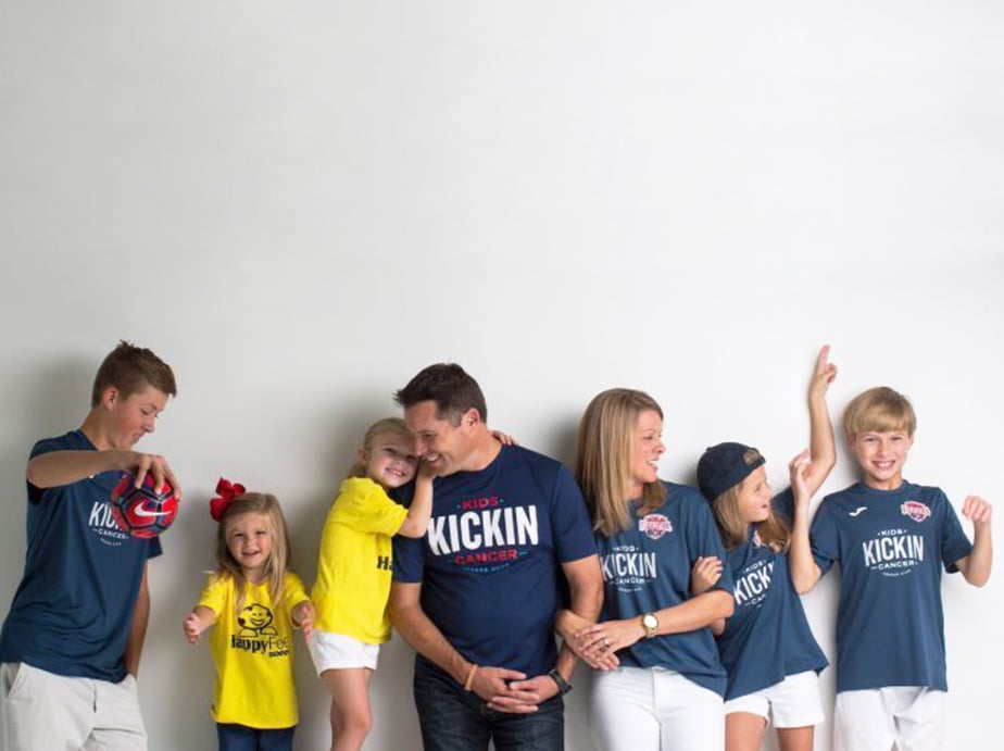 Cancer Kickers owners and founders the Clothiers family photo in player kit gear