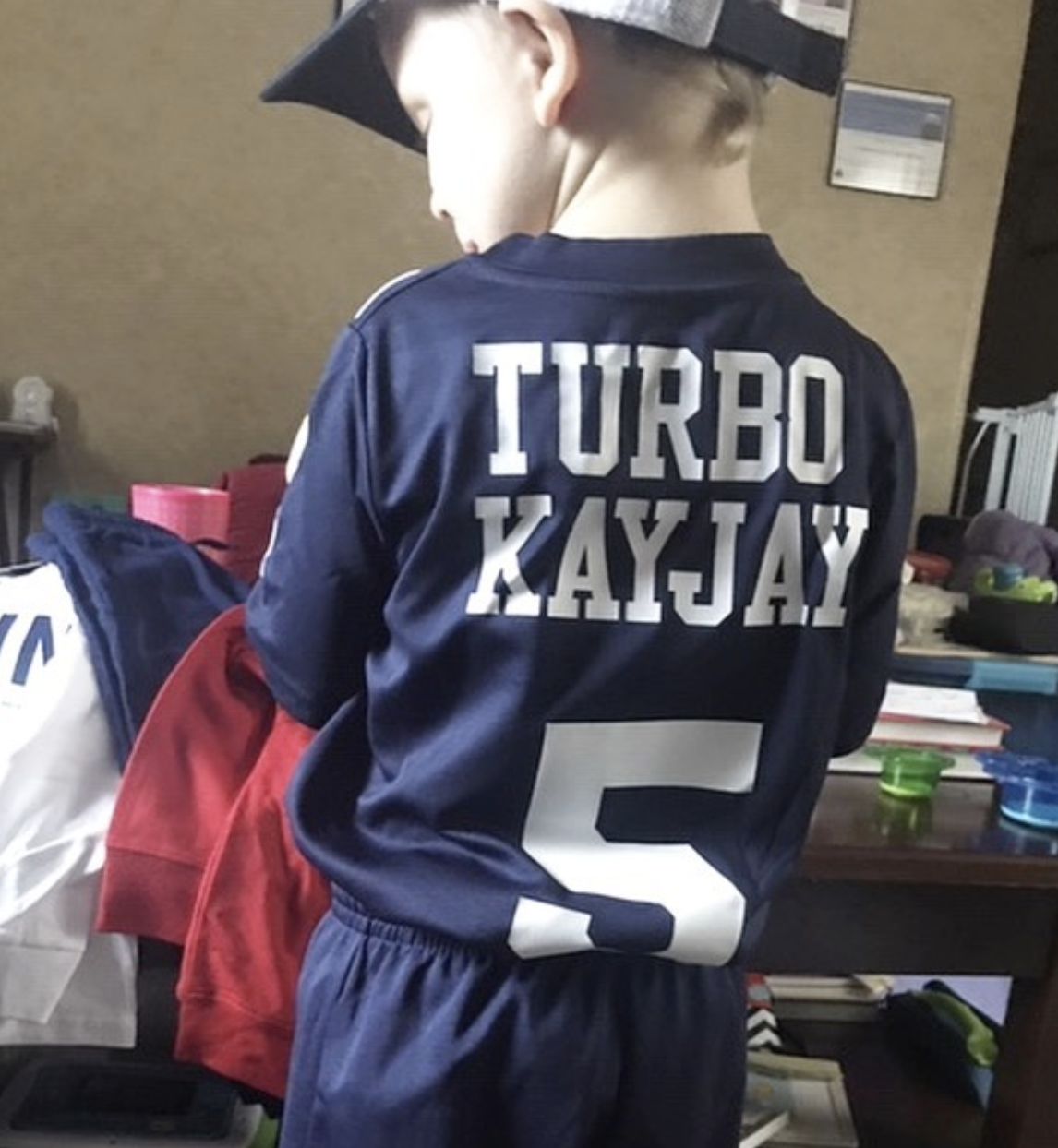 Cancer Kickers Teammate Kayjay showing back of nike jersey custom name and number turbo kayjay 5