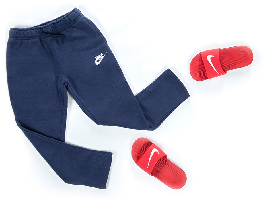 Cancer Kickers player kits teammates blue nike sweats red nike slides in a running layout